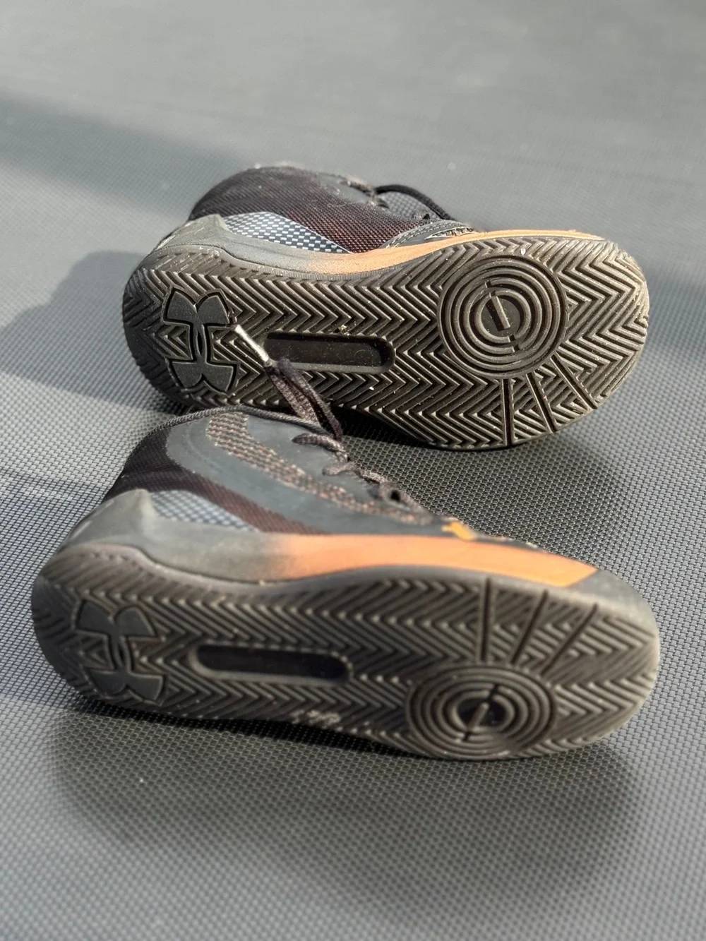 Under Armour Kids Black Sneakers with Orange Accents